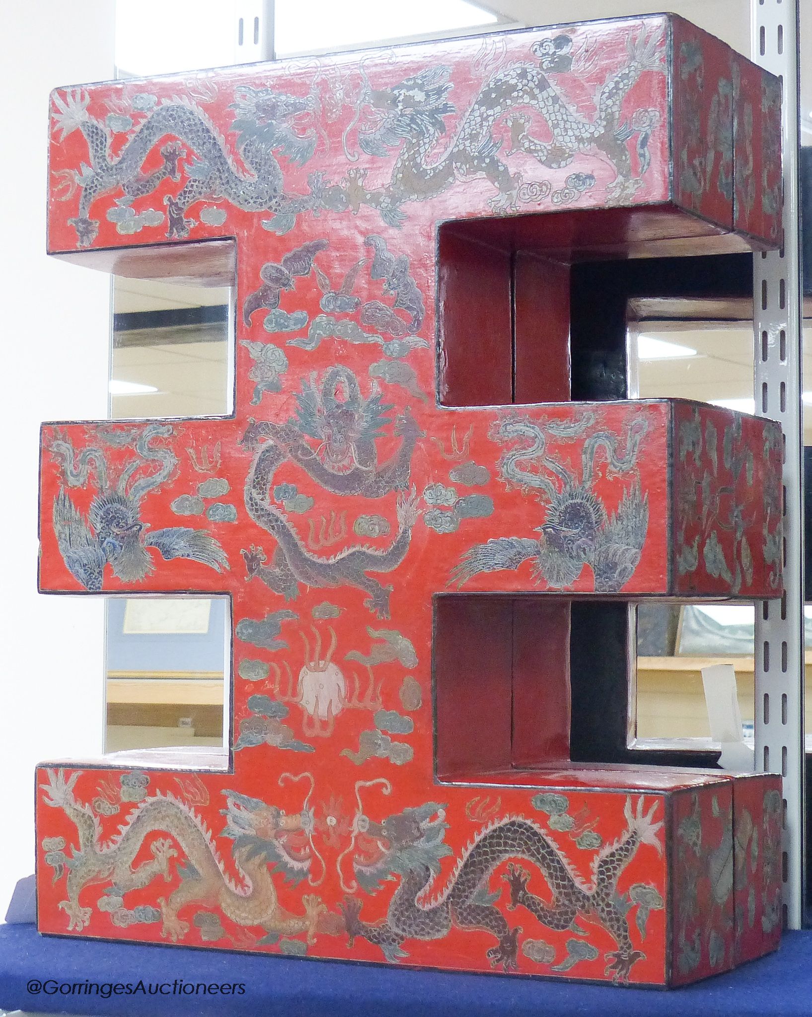 An Oriental painted papier mache stand
